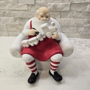 Department 56 Santa with Red Apron and Train
